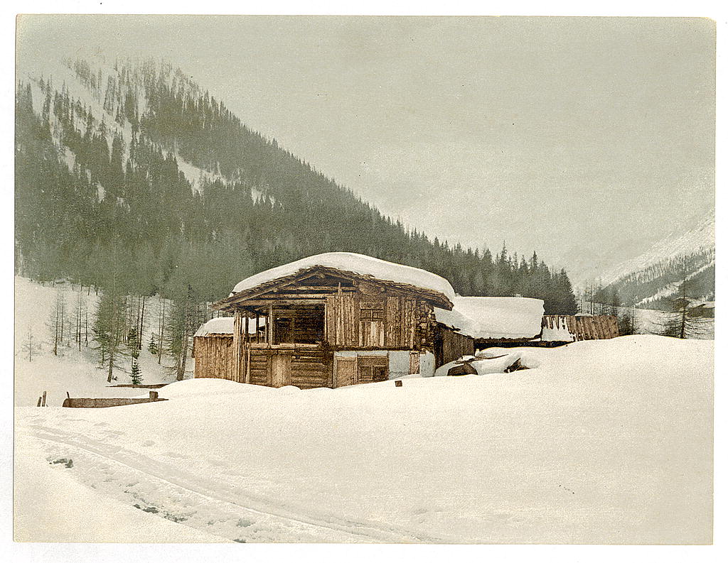 A picture of Winter scene with log structure, Grisons, Switzerland